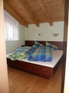 Łóżko lub łóżka w pokoju w obiekcie Appartement beim Brunnen 12