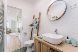 Kúpeľňa v ubytovaní Nádas Center Home Badacsony