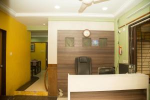 The lobby or reception area at Srujan Sarai Service Apartment