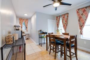 a kitchen and dining room with a table and chairs at Boston Queen Bedroom in Boston