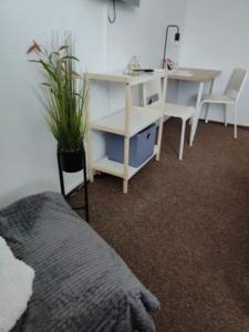 Postel nebo postele na pokoji v ubytování Hotel Olimpijski