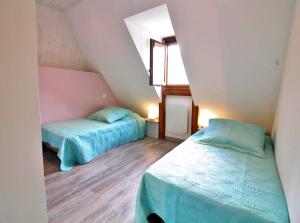 Postel nebo postele na pokoji v ubytování Maison de charme à Guchan avec vue sur la montagne et jacuzzi