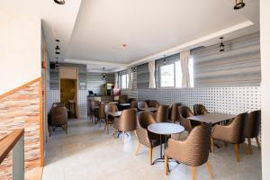 Posezení v ubytování Blooming Suites