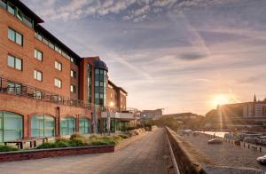 a rendering of a city street with buildings at Best Western Plus The Quays Hotel Sheffield in Sheffield