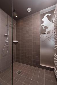 Koupelna v ubytování Familotel Alphotel