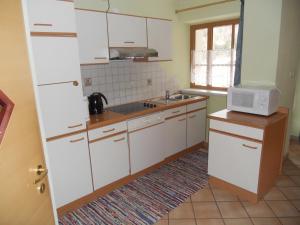 Kuchnia lub aneks kuchenny w obiekcie Appartement beim Brunnen 12