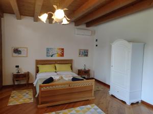 Posteľ alebo postele v izbe v ubytovaní B&B QUINTARELLI