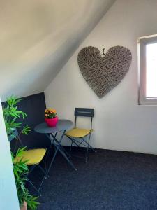 Część wypoczynkowa w obiekcie Appartement spacieux à Ingersheim avec vue sur jardin, 100 m²