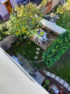 Ogród w obiekcie Appartement spacieux à Ingersheim avec vue sur jardin, 100 m²