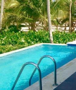 The swimming pool at or close to Suites Madrid Belfast 13 Ifema AirPort