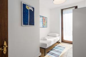 Posteľ alebo postele v izbe v ubytovaní Flats4rent Sabotino