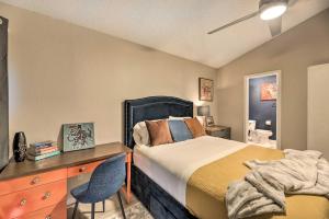 a bedroom with a bed and a desk and a chair at Gorgeous Austin Getaway about 8 Mi to Downtown! in Austin