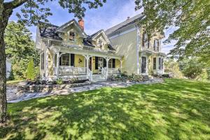 an old house with a large yard in front of it at Picturesque Jefferson Abode with On-Site Pond! in Jefferson