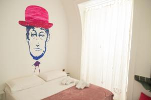 A bed or beds in a room at Neapolitan Style Apartrment