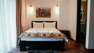 Postel nebo postele na pokoji v ubytování Chalet Belmont
