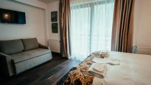 Postel nebo postele na pokoji v ubytování Chalet Belmont