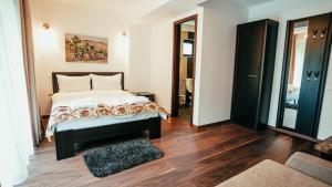 Postel nebo postele na pokoji v ubytování Chalet Belmont