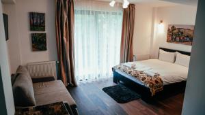 Postel nebo postele na pokoji v ubytování Chalet Belmont