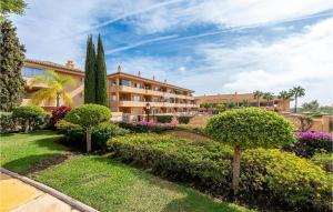 a resort with bushes and trees and a building at 2 Bedroom Gorgeous Apartment In Marbella-elviria in Marbella