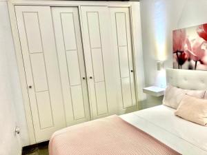 A bed or beds in a room at El rinconcito de Robles