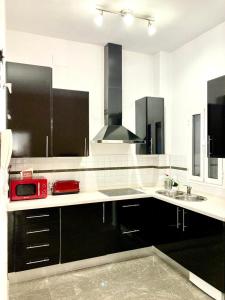 A kitchen or kitchenette at El rinconcito de Robles
