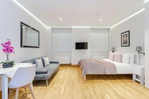 Cleveland Residences Russell Square客房内的一张或多张床位