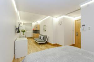 Cleveland Residences Russell Square客房内的一张或多张床位