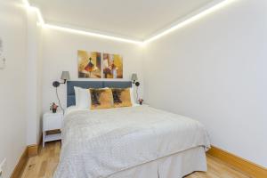 Cleveland Residences Russell Square客房内的一张或多张床位