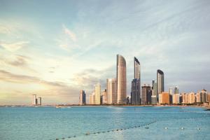 a city skyline with skyscrapers in the background at Copthorne Downtown by Millennium in Abu Dhabi
