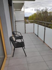 Balkón alebo terasa v ubytovaní Apartament Parkowa