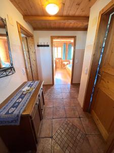 a kitchen with a stove top oven in a room at Ferienhaus Serafina in Rieden am Forggensee