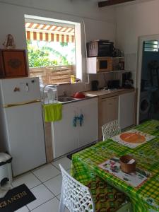 Kuchyňa alebo kuchynka v ubytovaní Pinpin