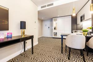 Televízia a/alebo spoločenská miestnosť v ubytovaní VacationClub - Baltic Park Fort Apartament G.209