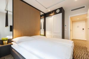Posteľ alebo postele v izbe v ubytovaní VacationClub - Baltic Park Fort Apartament G.209 + 8 fotografií