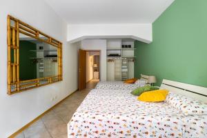 Łóżko lub łóżka w pokoju w obiekcie Portobello Apartments