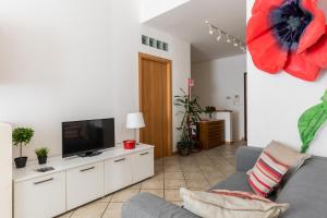 Telewizja i/lub zestaw kina domowego w obiekcie Portobello Apartments