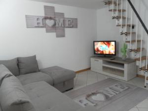 A television and/or entertainment centre at Casa Catania Inn