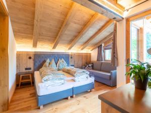Postel nebo postele na pokoji v ubytování Apartments Heissangerer + 37 fotografií