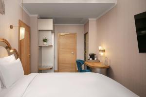 Allure Hotel & Residence Prague客房内的一张或多张床位