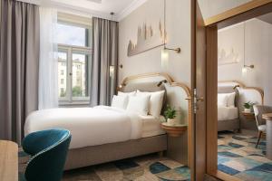 Allure Hotel & Residence Prague客房内的一张或多张床位