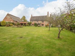 ノリッジにあるManor Farm Houseの古煉瓦造りの家