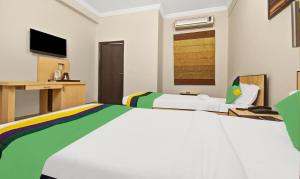 TV a/nebo společenská místnost v ubytování Treebo Maharaja Residency Family Hotel