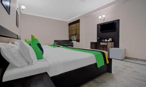 TV a/nebo společenská místnost v ubytování Treebo Maharaja Residency Family Hotel