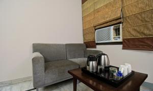 Příslušenství pro přípravu čaje a kávy v ubytování Treebo Maharaja Residency Family Hotel