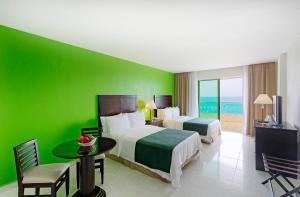 TV a/nebo společenská místnost v ubytování Holiday Inn Campeche by IHG