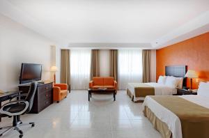 TV a/nebo společenská místnost v ubytování Holiday Inn Campeche by IHG