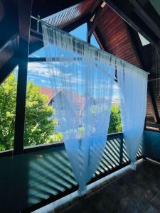 Fotografia z galérie ubytovania Klebi’s apartmanház v destinácii Balatonföldvár
