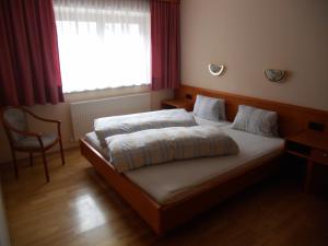 Łóżko lub łóżka w pokoju w obiekcie Appartement beim Brunnen 12