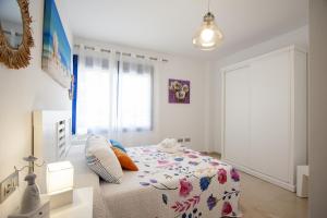 Łóżko lub łóżka w pokoju w obiekcie Apartamento Playa Torrox