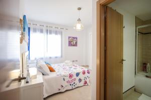 Łóżko lub łóżka w pokoju w obiekcie Apartamento Playa Torrox